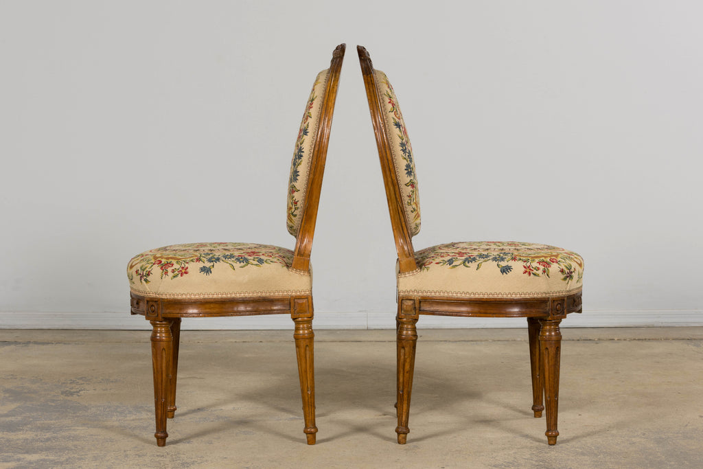 Set of Six Late 19th Century French Louis XVI Style Walnut Chairs with Pair of Fauteuils