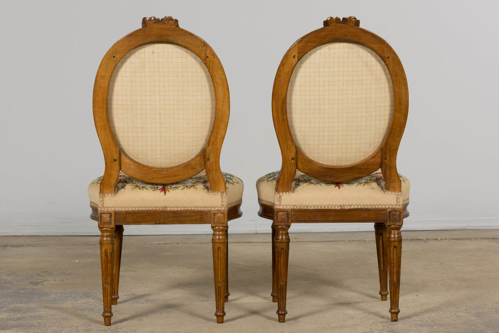 Set of Six Late 19th Century French Louis XVI Style Walnut Chairs with Pair of Fauteuils