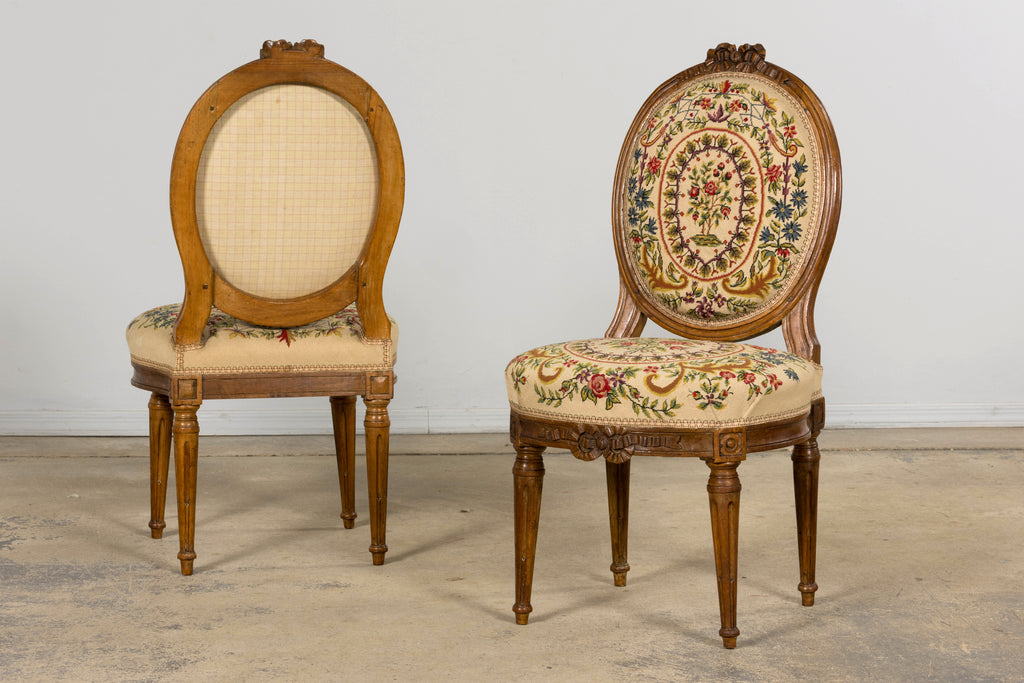Set of Six Late 19th Century French Louis XVI Style Walnut Chairs with Pair of Fauteuils