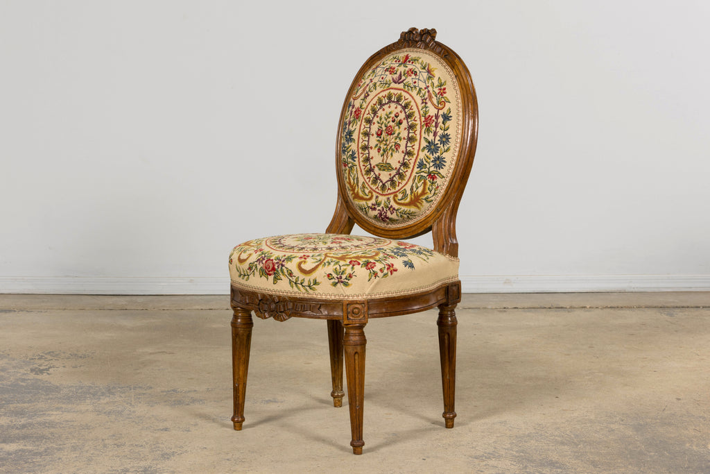 Set of Six Late 19th Century French Louis XVI Style Walnut Chairs with Pair of Fauteuils