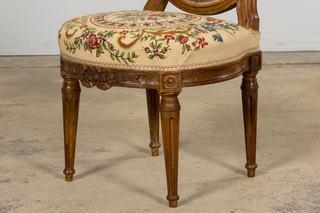 Set of Six Late 19th Century French Louis XVI Style Walnut Chairs with Pair of Fauteuils
