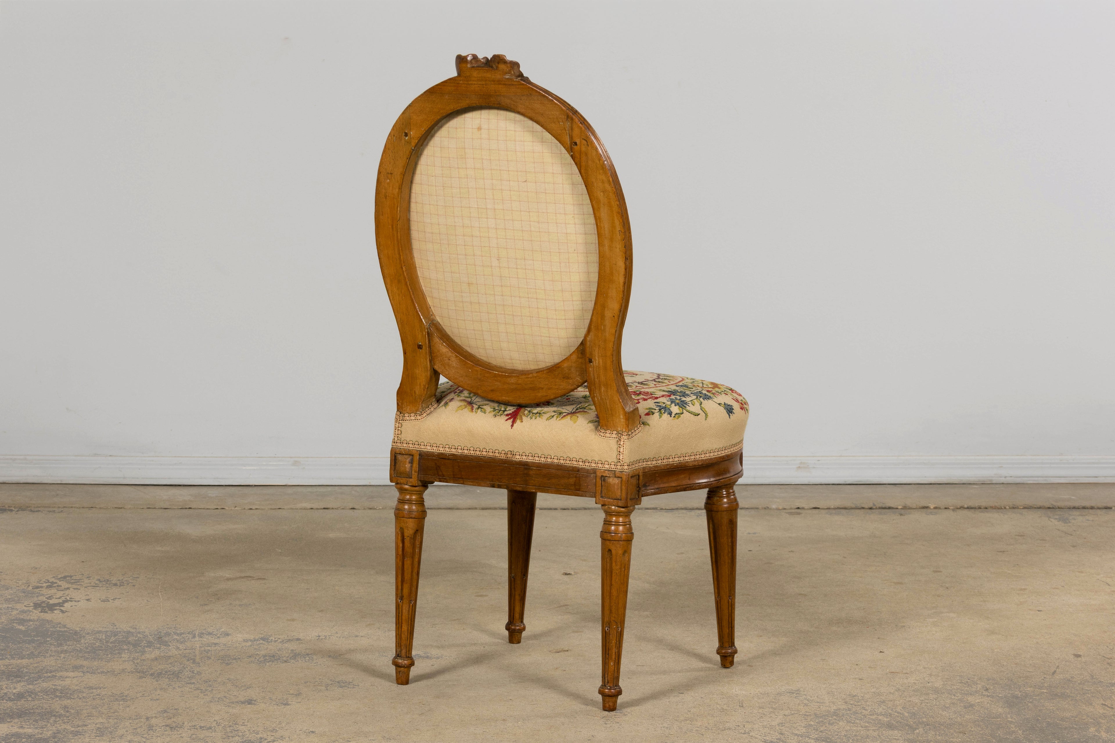 Set of Six Late 19th Century French Louis XVI Style Walnut Chairs with Pair of Fauteuils