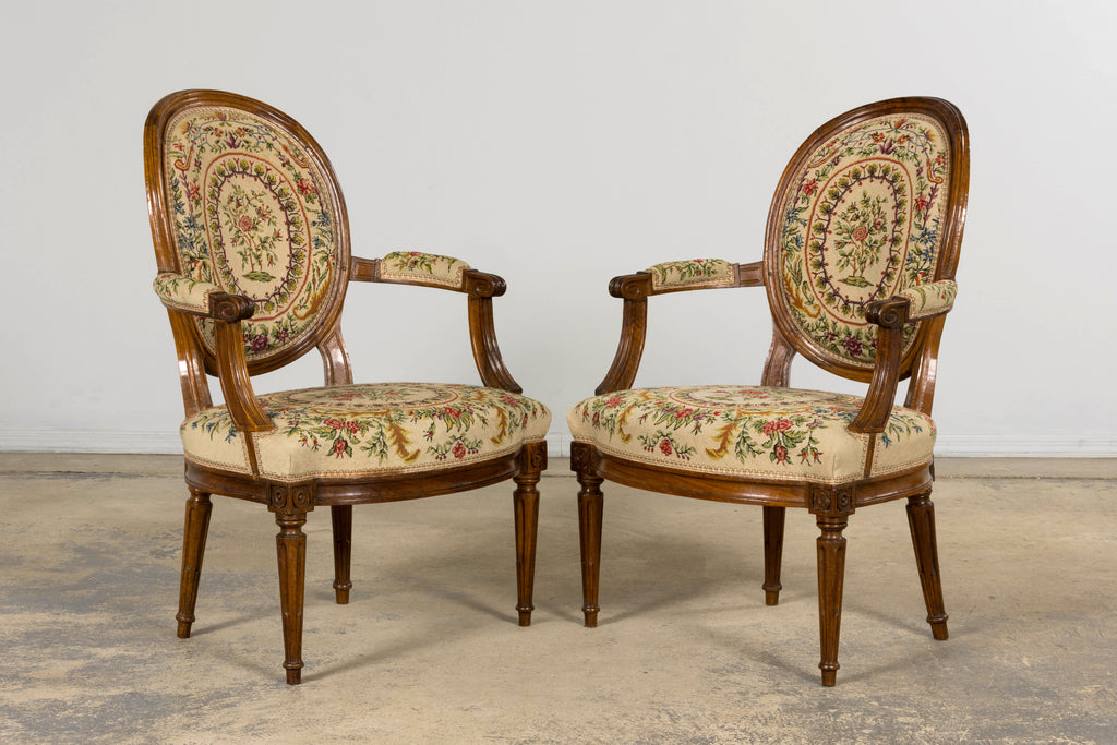 Set of Six Late 19th Century French Louis XVI Style Walnut Chairs with Pair of Fauteuils