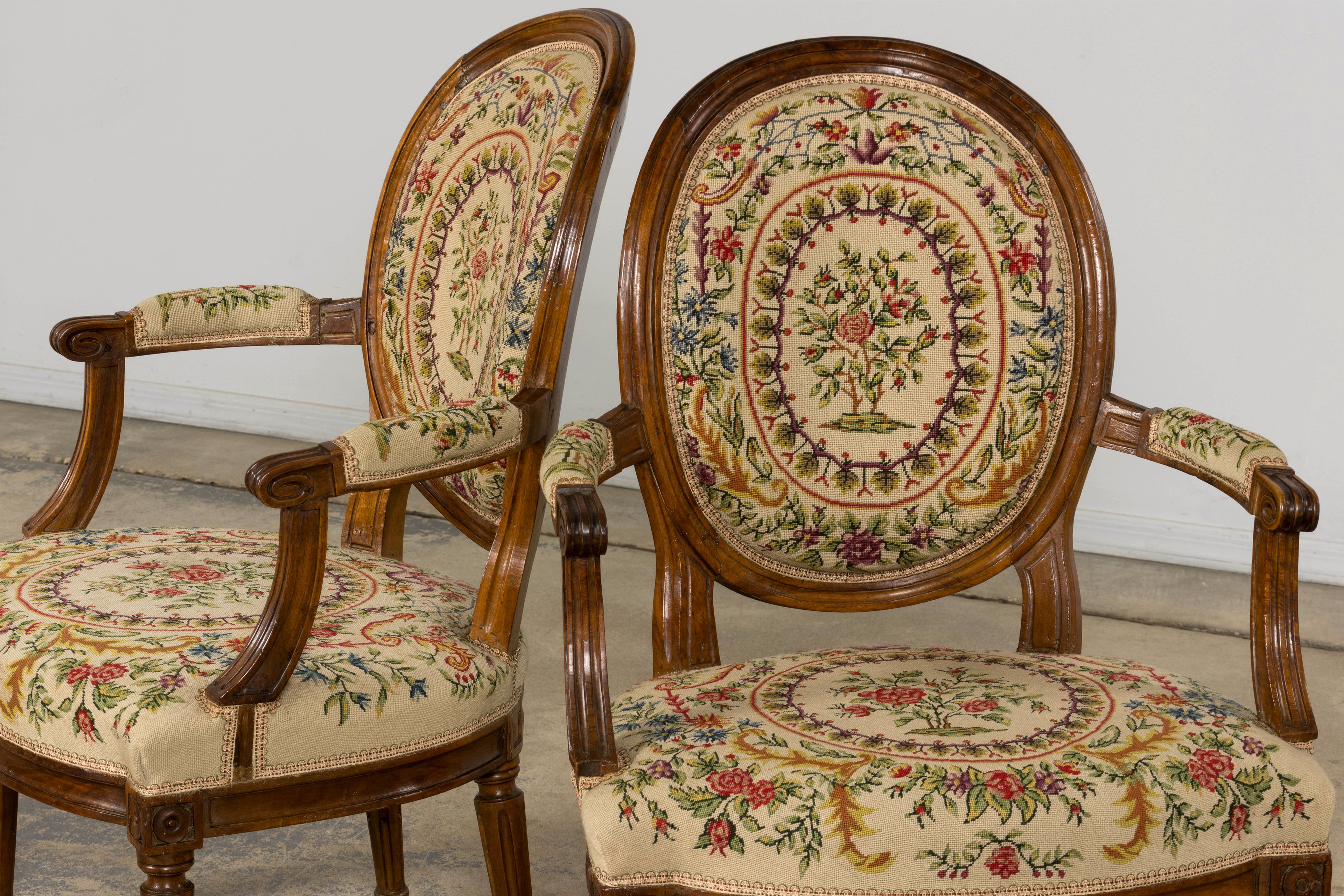 Set of Six Late 19th Century French Louis XVI Style Walnut Chairs with Pair of Fauteuils