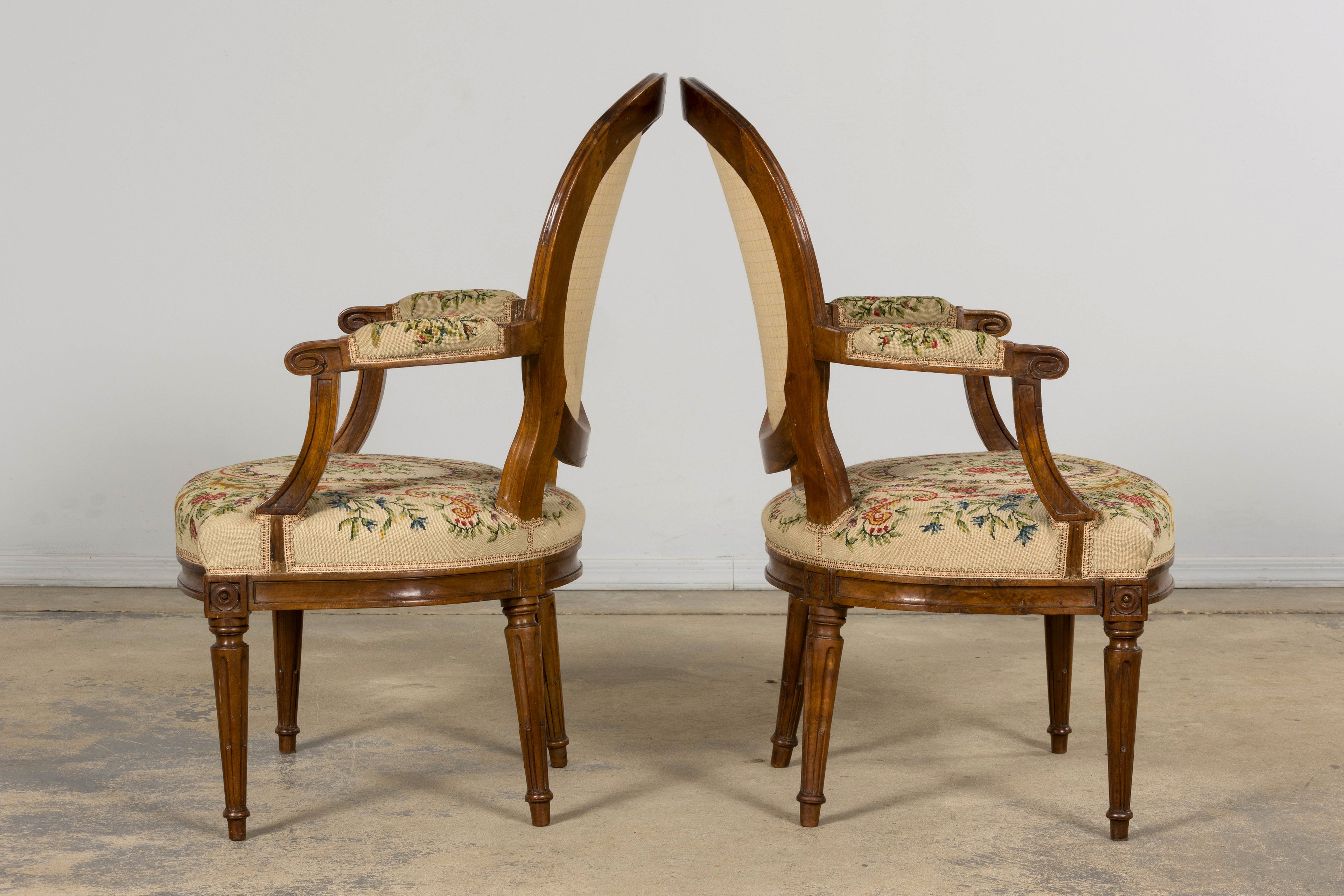 Set of Six Late 19th Century French Louis XVI Style Walnut Chairs with Pair of Fauteuils