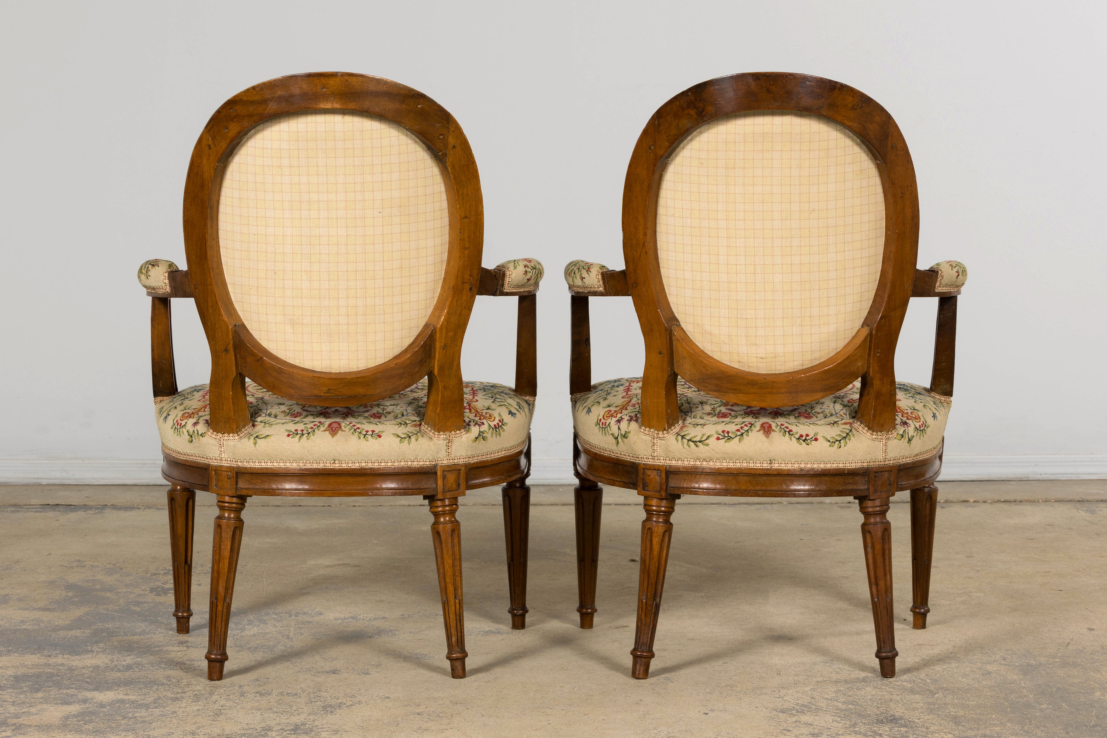 Set of Six Late 19th Century French Louis XVI Style Walnut Chairs with Pair of Fauteuils