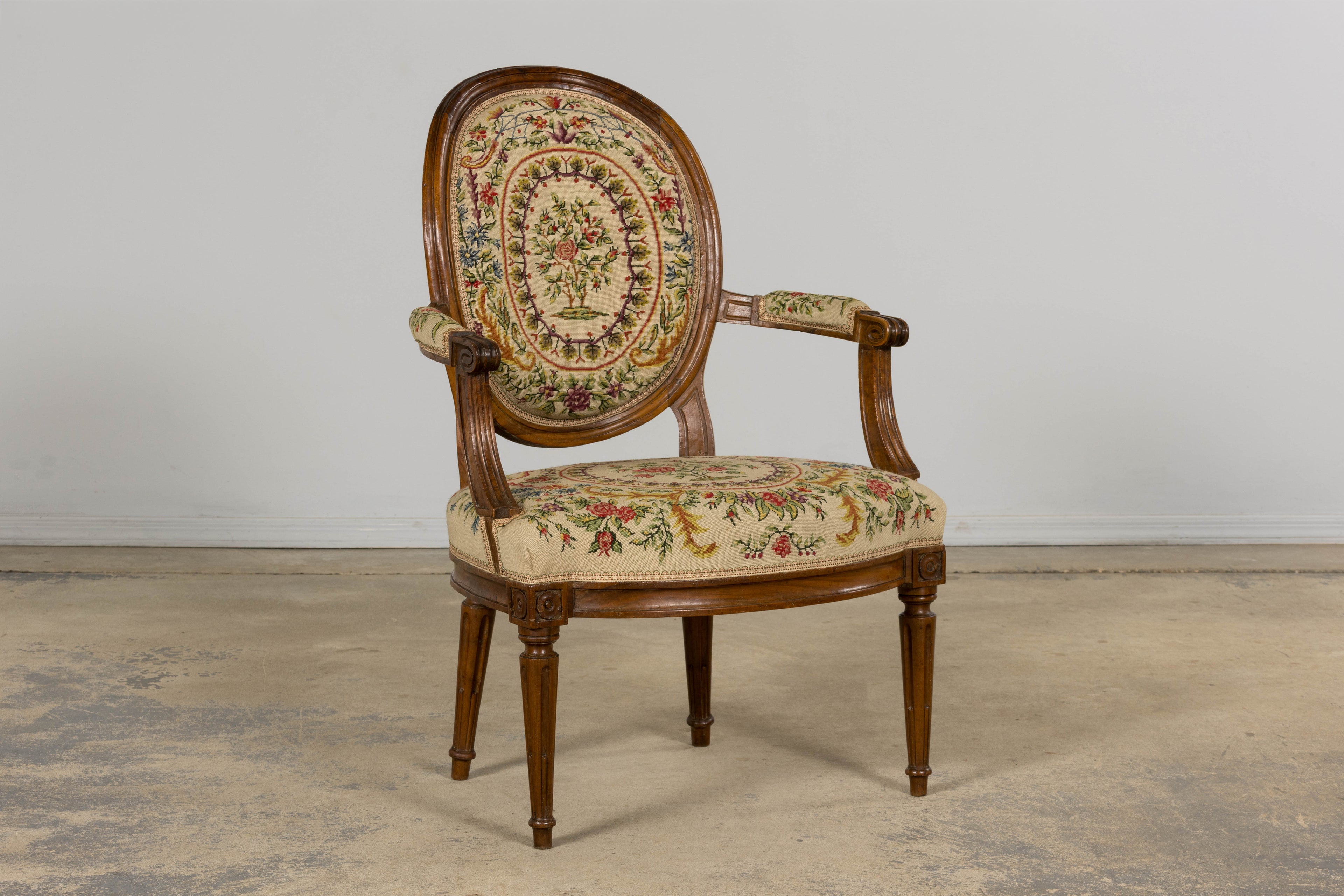 Set of Six Late 19th Century French Louis XVI Style Walnut Chairs with Pair of Fauteuils