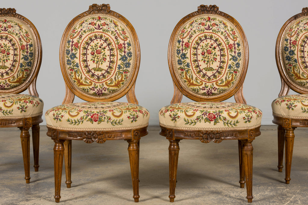 Set of Six Late 19th Century French Louis XVI Style Walnut Chairs with Pair of Fauteuils