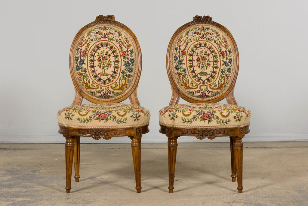 Set of Six Late 19th Century French Louis XVI Style Walnut Chairs with Pair of Fauteuils