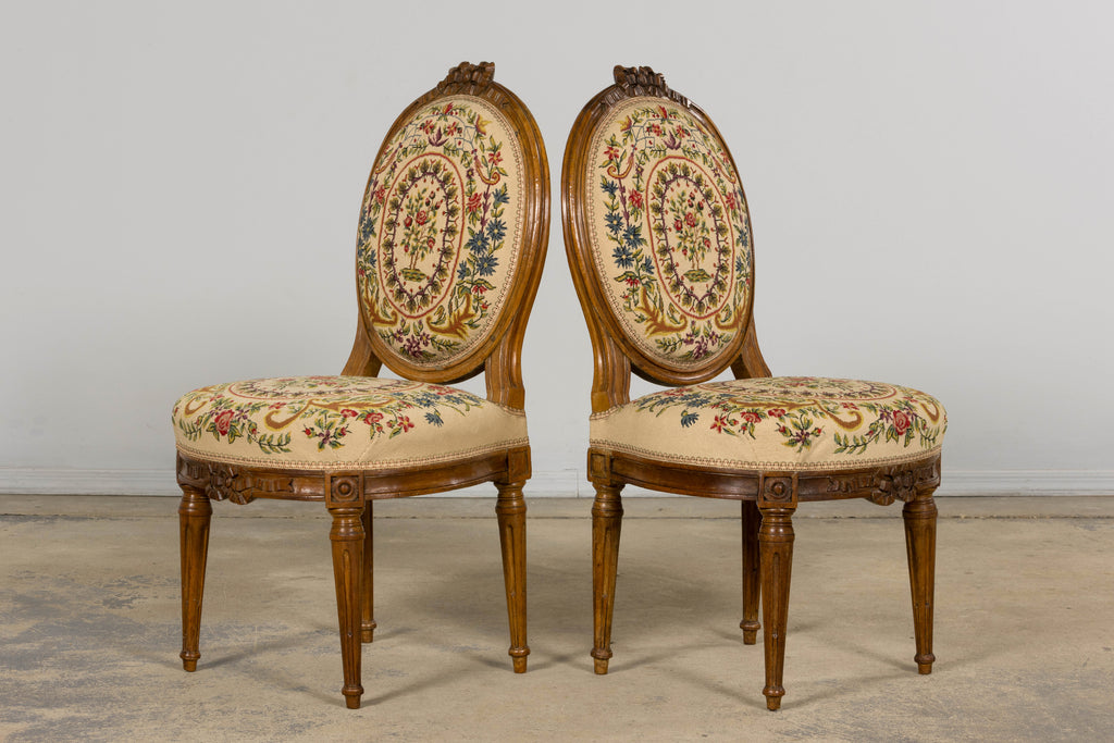 Set of Six Late 19th Century French Louis XVI Style Walnut Chairs with Pair of Fauteuils