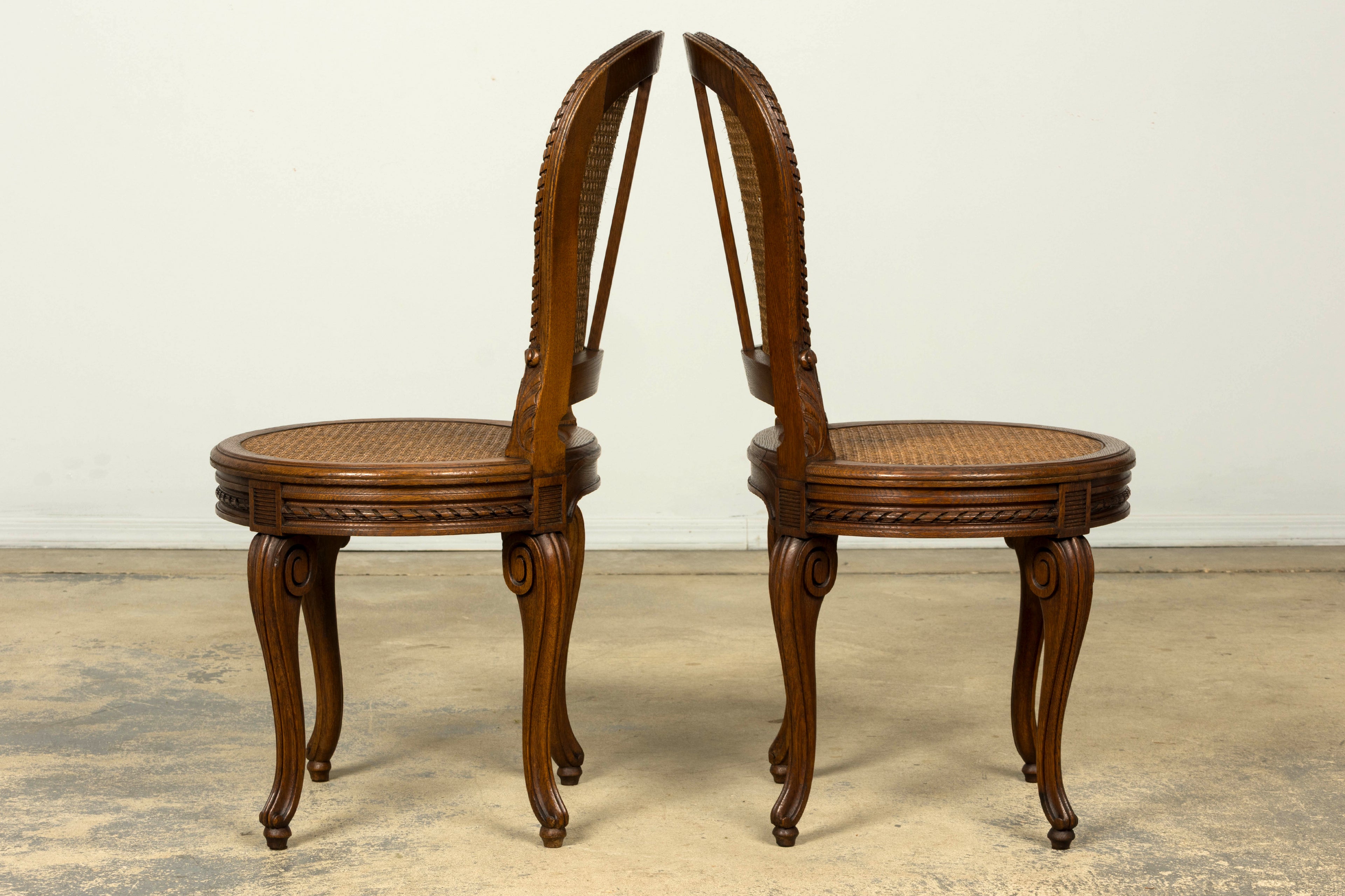Set of Six Mid-19th Century French Napoleon III Carved Oak and Cane Dining Chairs