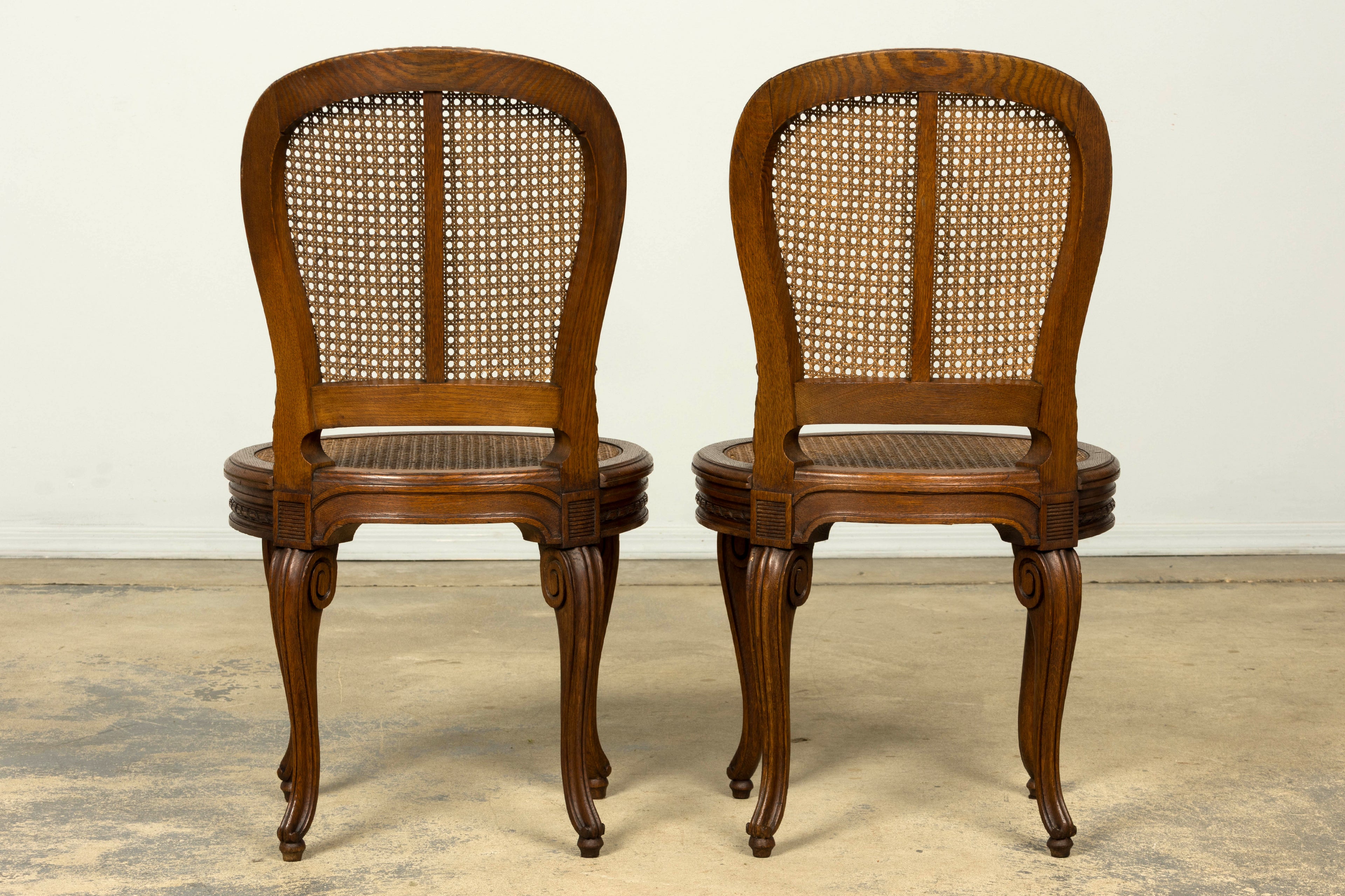 Set of Six Mid-19th Century French Napoleon III Carved Oak and Cane Dining Chairs