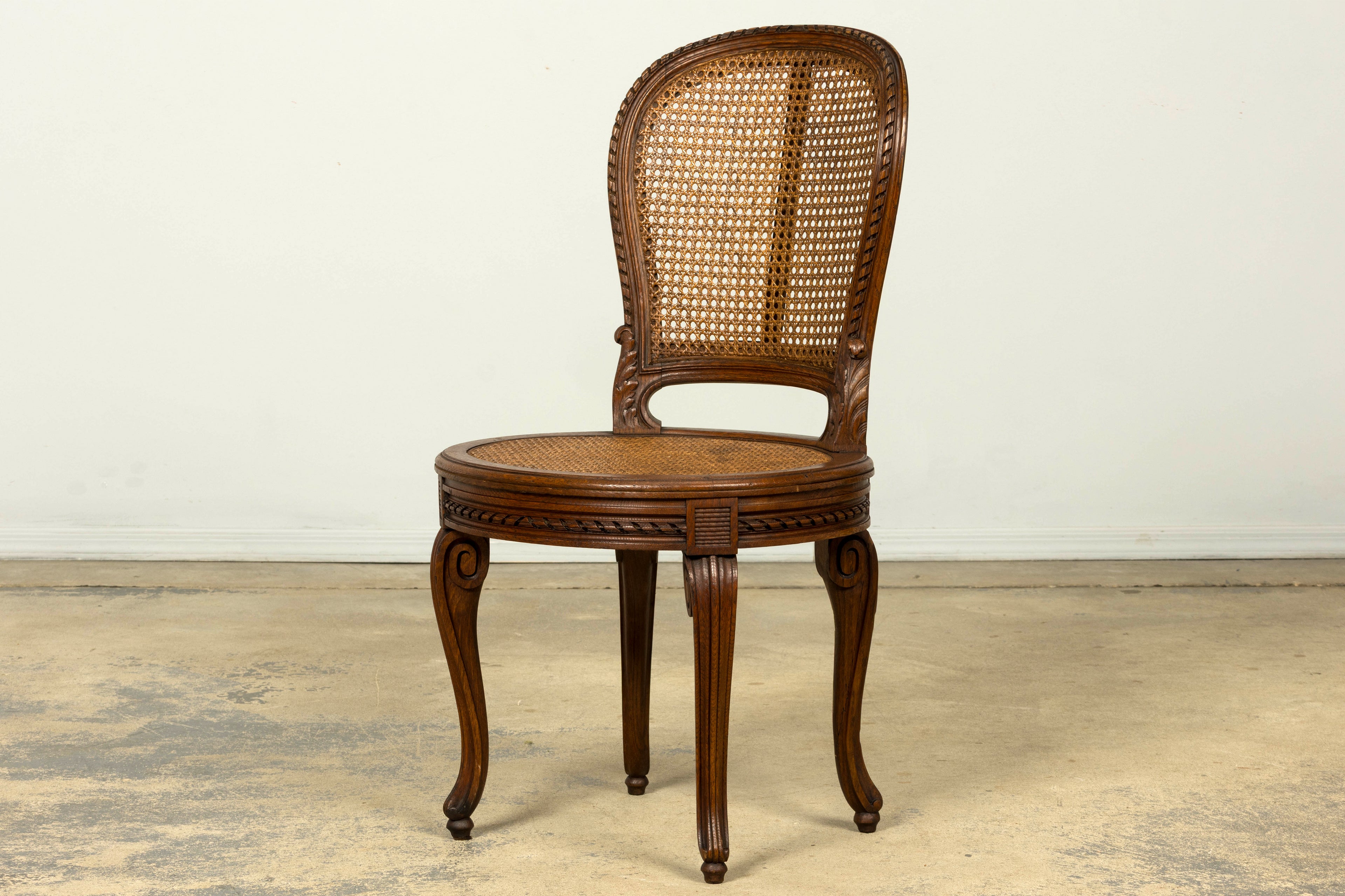 Set of Six Mid-19th Century French Napoleon III Carved Oak and Cane Dining Chairs