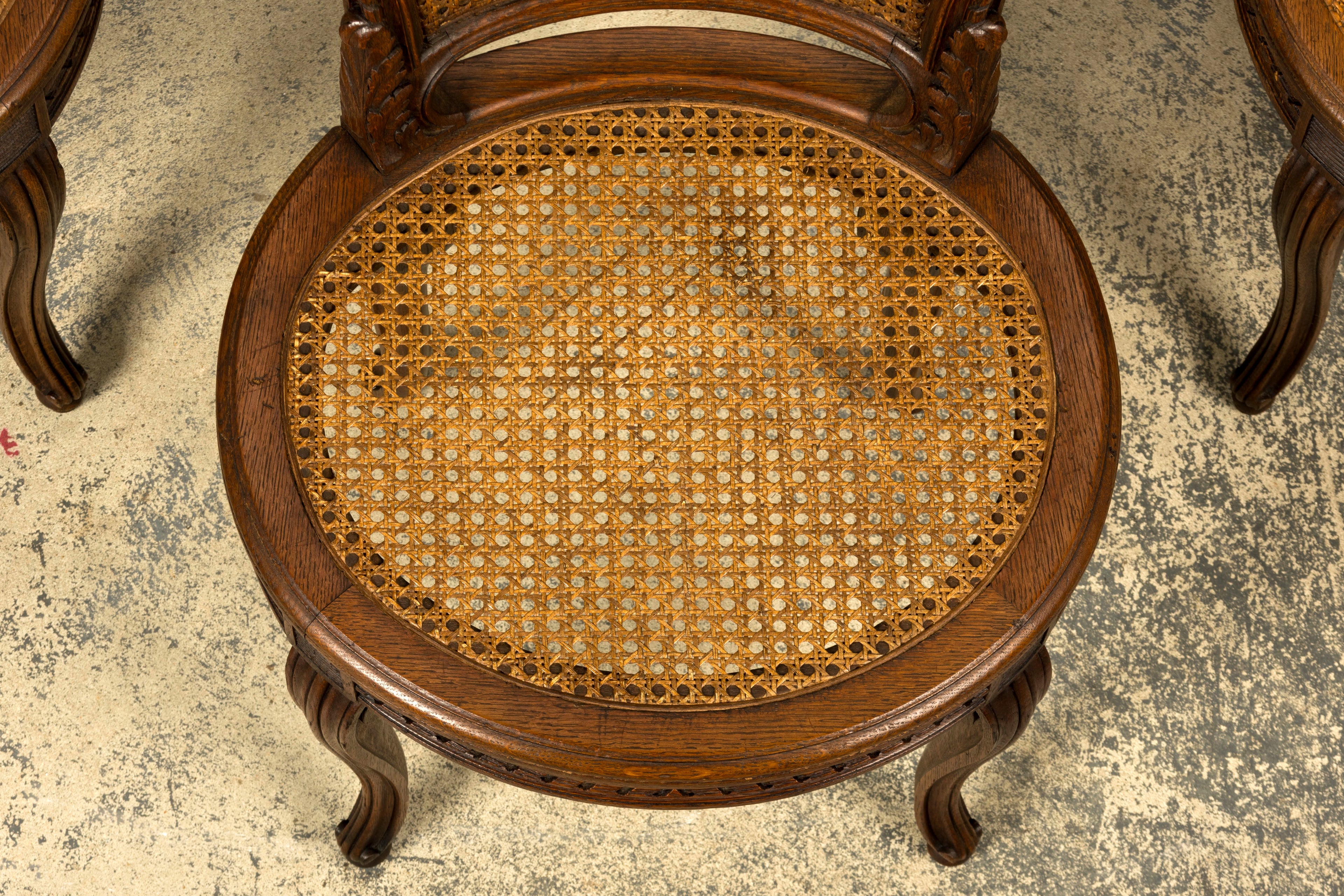 Set of Six Mid-19th Century French Napoleon III Carved Oak and Cane Dining Chairs