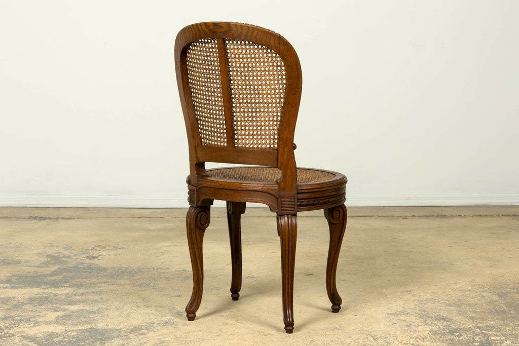 Set of Six Mid-19th Century French Napoleon III Carved Oak and Cane Dining Chairs