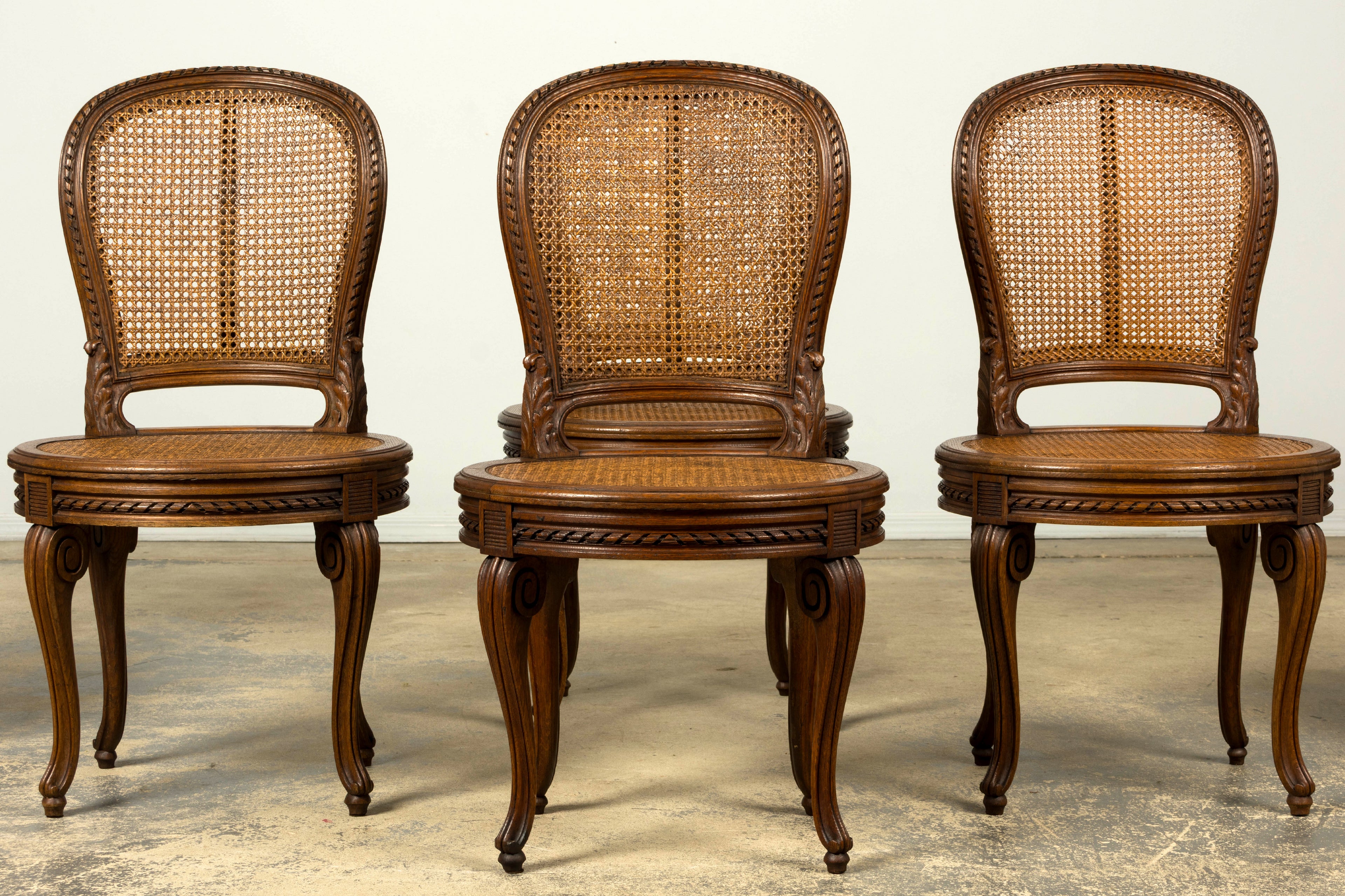 Set of Six Mid-19th Century French Napoleon III Carved Oak and Cane Dining Chairs