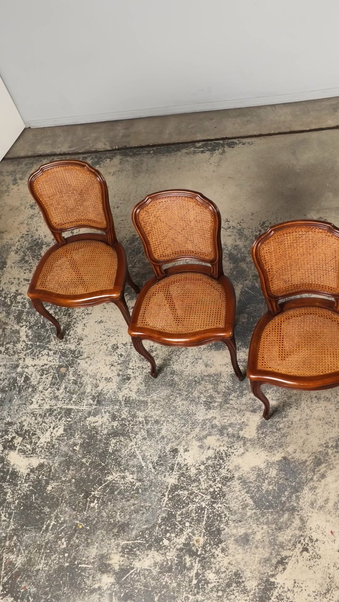 Set of 8 Early 20th Century French Louis XV Style Walnut Cane Dining Chairs